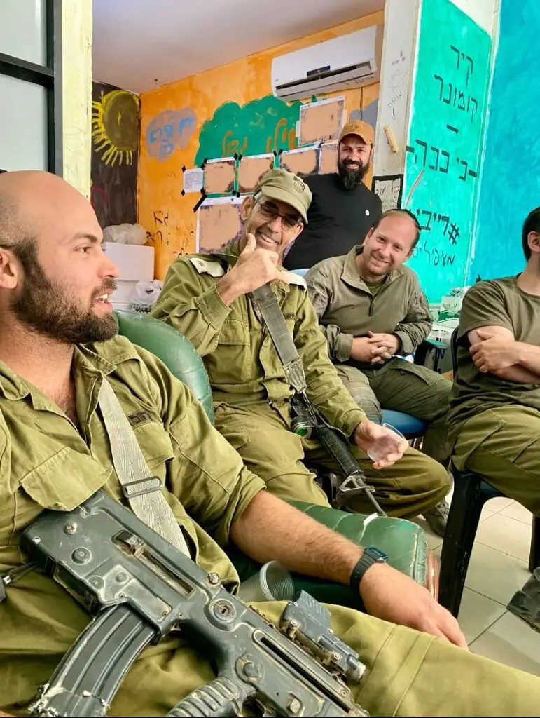 L-R Aviad, Eshhar and his 40-year-old gun strap, Daniel (at back), and Avi